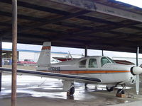 N6593B @ CCB - Parked out of the rain - by Helicopterfriend