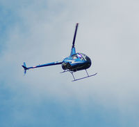 G-HIZZ - Robinson R44  passing over the house - by jetjockey