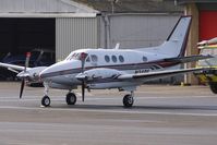 N34RF @ EGBJ - Beech 90A visitor to Staverton - by Terry Fletcher