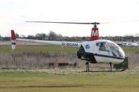 G-BOAM @ EGTC - Robinson R-22 Beta at Cranfield Airport in 2006. - by Malcolm Clarke