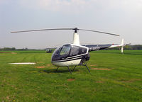 G-BVGS @ EGCJ - Robinson R-22 Beta at Sherburn-in-Elmet Airfield in 2004. - by Malcolm Clarke