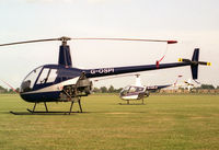 G-OSPI @ EGTC - Robinson R-22 Beta at Cranfield Airport in 1988. - by Malcolm Clarke