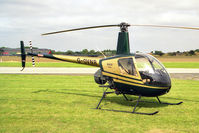 G-OVNR @ EGBR - Robinson R-22 Beta at Breighton Airfield in 1998. - by Malcolm Clarke