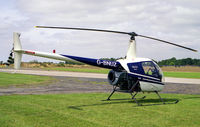 G-BNUZ @ EGBR - Robinson R-22 Beta at Breighton Airfield in 1998. Destroyed in an accident at Biggin, North Yorkshire on December 2nd 2000. - by Malcolm Clarke