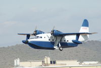 N7025J @ KDVT - Landing gear cycling up just moments after take-off - by Rom Solene