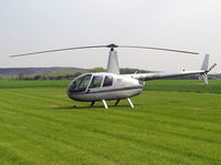 G-BZMG @ EGCJ - Robinson R-44 Raven at Sherburn-in-Elmet Airfield, UK in 2004. - by Malcolm Clarke