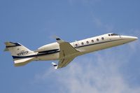 N797CP @ KSAT - climb out of San Antonio IAP - by Friedrich Becker