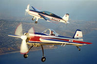 N300EM - Me in the Extra 300 off the wing of Yak N155DH - by CindyS