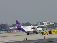N726FX @ ONT - Taxiing to runway 26L - by Helicopterfriend