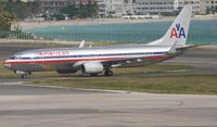 N914AN @ TNCM - American N914AN just landed at TNCM and taxing to parking on the main ramp