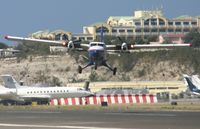 PJ-WIH @ TNCM - winair PJ-WIH departing TNCM with some heavy cross wind