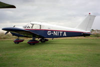 G-NITA @ EGTC - Piper PA-28-180 Cherokee C at Cranfield Airport in 1993. - by Malcolm Clarke