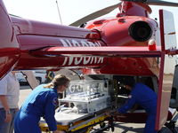 N38RX @ CCB - Loading infant incubator - by Helicopterfriend
