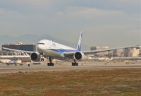 JA733A @ KLAX - ANA Boeing 777-381 (ER), JA733A departing 25R KLAX. - by Mark Kalfas