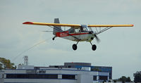 N630AP @ LGB - The number 1 banner tow pilot approaching the poles - by Marty Kusch