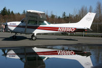 N9898Q @ BLI - A puddle makes for some great photography! - by Duncan Kirk