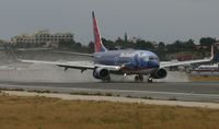 N809SY @ TNCM - Sun country N809SY landing at TNCM on a very wet runway 10 - by Daniel Jef