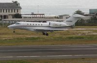 N999QS @ TNCM - N999QS landing at TNCM runway 10 - by Daniel Jef