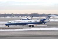 N154GJ @ KORD - CL-600-2C10 - by Mark Pasqualino