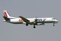 G-CDEA @ EGNT - Saab 2000 on approach to Rwy 07 at Newcastle Airport in 2008. - by Malcolm Clarke