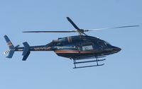 N533HC @ TNCM - N533HC departing the helipad at TNCM - by Daniel Jef