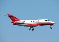 N200DV @ DTN - Landing on runway 14 at Downtown Shreveport. - by paulp