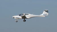 N414FP @ KAPF - Arriving on runway 32 - by Kreg Anderson