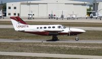N424TW @ KAPF - Departing runway 32 - by Kreg Anderson