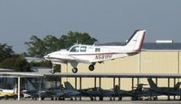 N581PF @ KAPF - Arriving on runway 32 - by Kreg Anderson