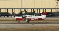 N627FT @ KAPF - Departing runway 32. This plane is sporting a Florida Institute of Technology title. - by Kreg Anderson