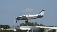 N771JB @ KAPF - Arriving on runway 32 - by Kreg Anderson