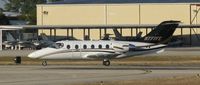 N777FE @ KAPF - Departing runway 32 - by Kreg Anderson