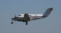 N900RH @ KAPF - Arriving on runway 32 - by Kreg Anderson