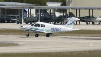 N920AC @ KAPF - Departing runway 32 - by Kreg Anderson