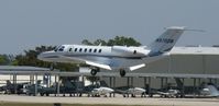 N970DM @ KAPF - Arriving on runway 32 - by Kreg Anderson