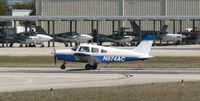 N974AC @ KAPF - Departing runway 32 - by Kreg Anderson