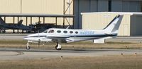 N4656A @ KAPF - Departing runway 32 - by Kreg Anderson