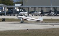 N42RY @ KAPF - Thank you for identifying this aircraft for me. N42RY is seen departing runway 32. - by Kreg Anderson
