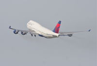 N671US @ KLAX - Delta Airlines Boeing 747-451, N671US, DAL283 25R departure en route to RJAA (Narita Int'l). - by Mark Kalfas