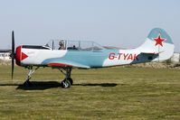 G-TYAK @ EGBR - 1989 Intreprinderea De Avioane Bacau YAK-52 - One of the many aircraft at Breighton on a fine Spring morning