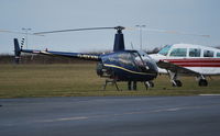 G-BXXN @ EGTB - Robinson R22 Beta Ex N720HH - by moxy