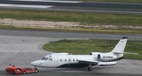N124WW @ TNCM - N124WW being towed to parking at tncm