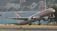 N644AA @ TNCM - N642AA departing TNCM runway 28 - by Daniel Jef