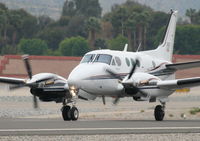 N3818C @ KPSP - MAGNUM EQUIPMENT LEASING INC Beechcraft King Air 90 departing 13L KPSP for KHND.. - by Mark Kalfas