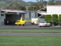 N7523T @ SZP - 2004 Robinson R44 II, Lycoming IO-540 derated to 245 Hp for 5 minutes, 205 Hp continuous, tug roll out of hangar - by Doug Robertson