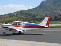 N7960K @ SZP - 1964 Beech 35-B33 DEBONAIR, Continental IO-470-K 225 Hp, taxi - by Doug Robertson