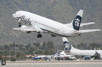 N769AS @ KPSP - Alaska Airlines Boeing 737-490, ASA313 to KSFO 13R departure KPSP. - by Mark Kalfas