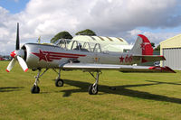 G-YAKN @ FISHBURN - Bacau Yak-52. In Russian AF colours. Seen here during a refuelling stop prior to performing with the Yakovlevs at the celebration of the 150th anniversary of the Opening of Seaham Docks. - by Malcolm Clarke