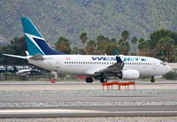 C-FIWJ @ KPSP - WESTJET Boeing 737-7CT, WJA1469 to CYYC,  taxiway Whiskey to 13R KPSP. - by Mark Kalfas