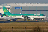 EI-DVE @ EGCC - About to vacate Runway 05L. - by MikeP
